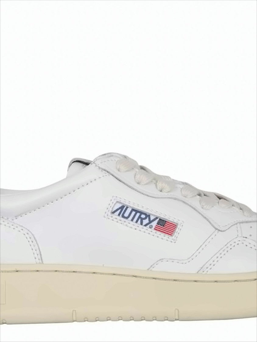 Clean White Leather Low-Top Sneakers with Perforated Detail
