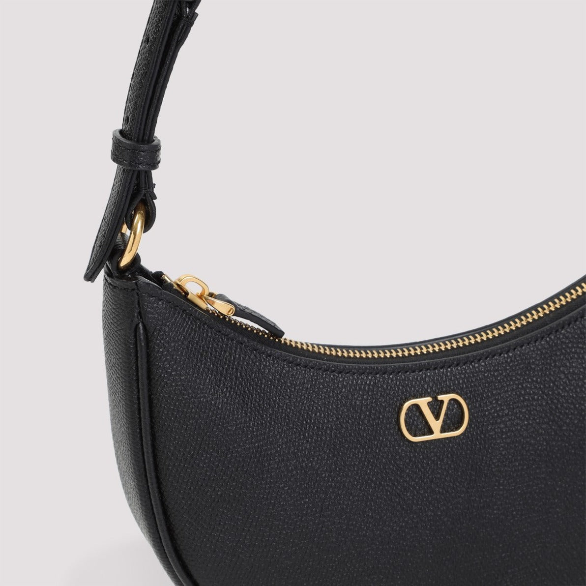 Compact Crescent-Shaped Grained Calf Leather Handbag