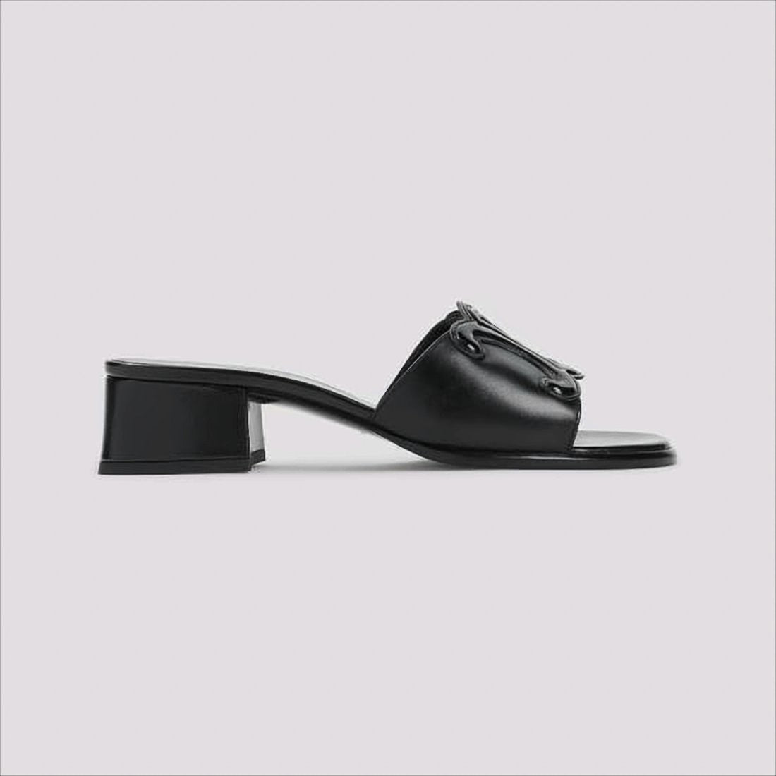 Open Toe Mules With Glossy Emblem Detail