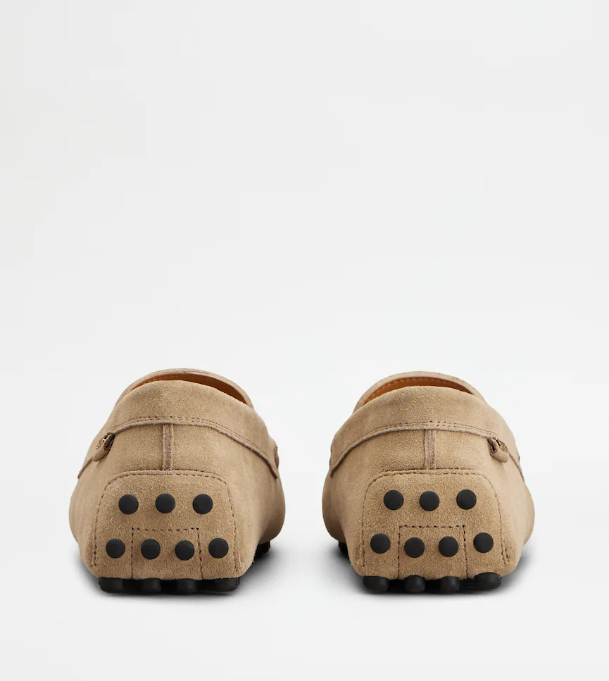 Classic Brown Leather Moccasins With Distinctive Detailing