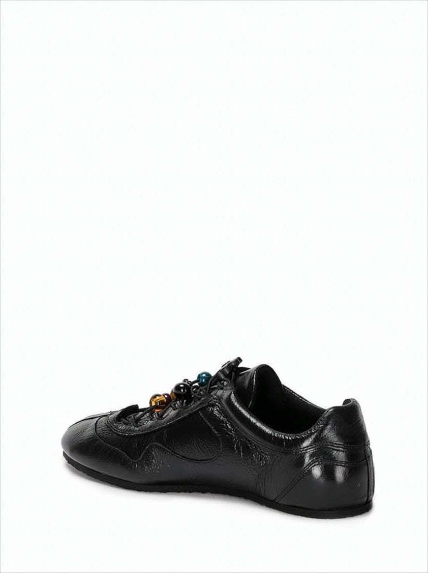 Pointed Toe Black Cowhide Flats with Floral Appliqués