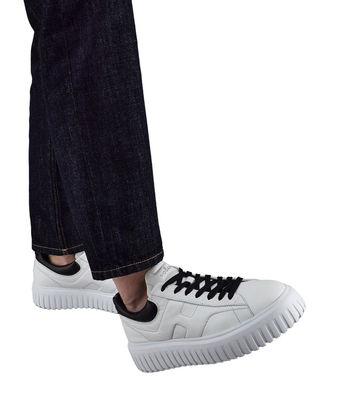 Dynamic White Leather Sneakers With Black Accents