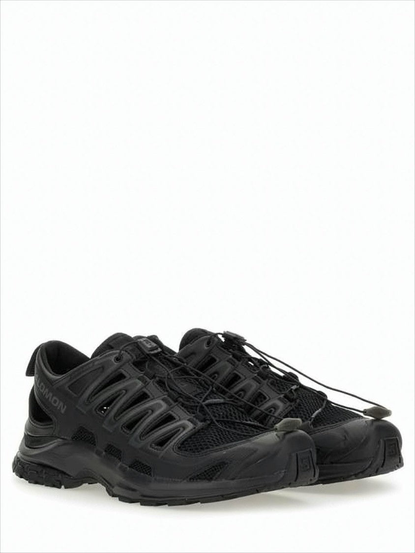 All-Black Athletic Sneakers with Quick-Pull Lacing System
