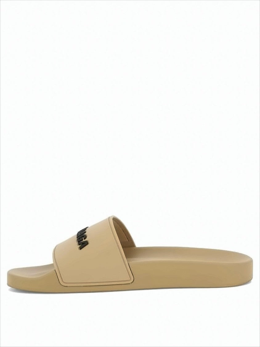 Rubber Slip-On Mules With Textured Sole And Raised Lettering