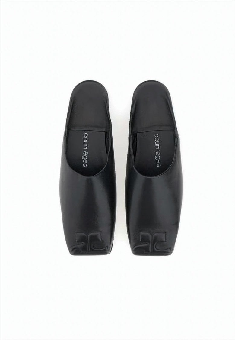 Minimalist Black Lambskin Slip-On Mules with Embossed Detail