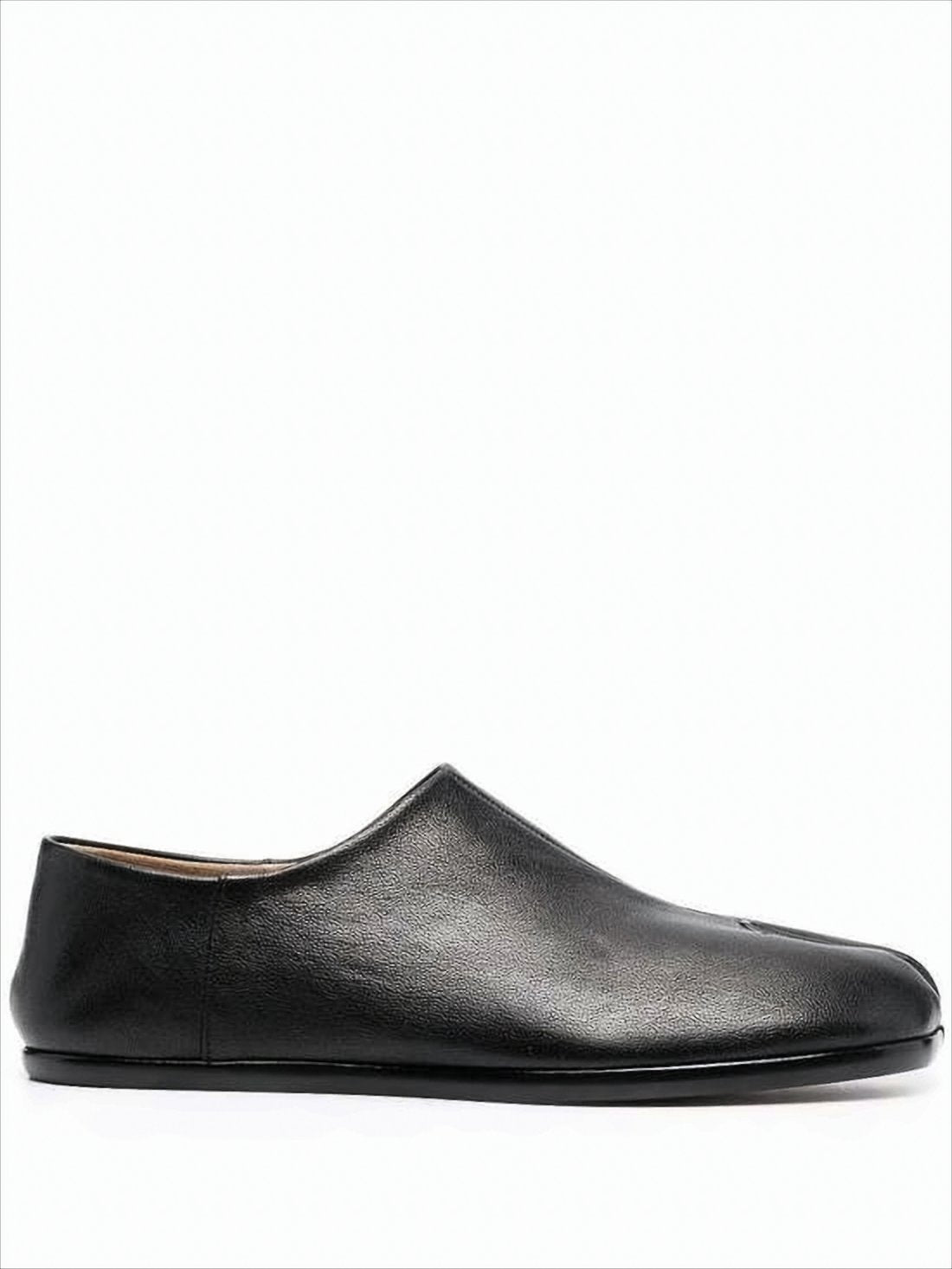 Minimalist Black Slip-On Shoes