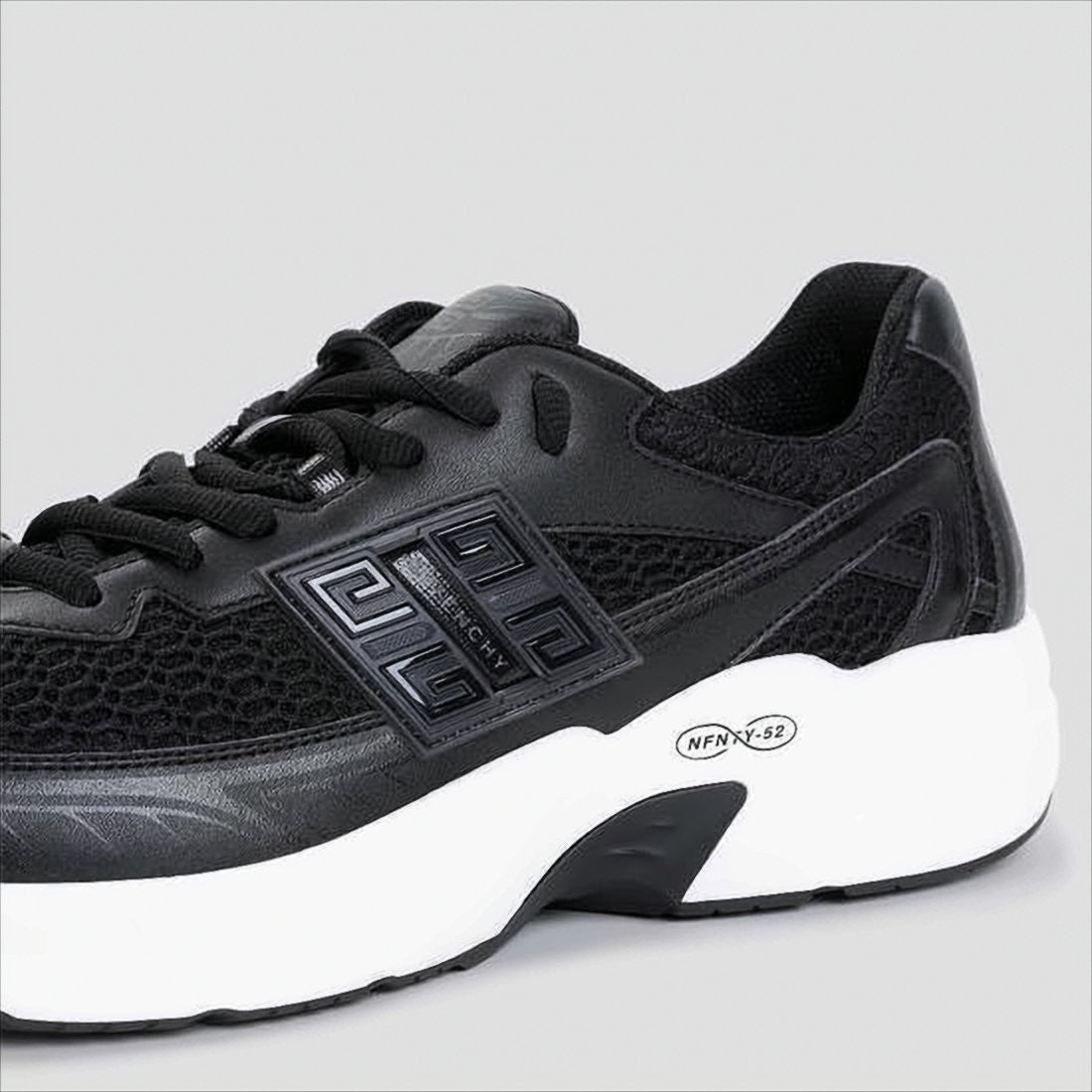 Sleek Black Mesh and Leather Sneakers with Distinctive Logo