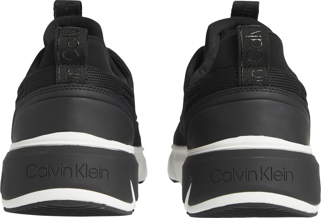 Black Sneakers With Textured Upper And Rubber Sole
