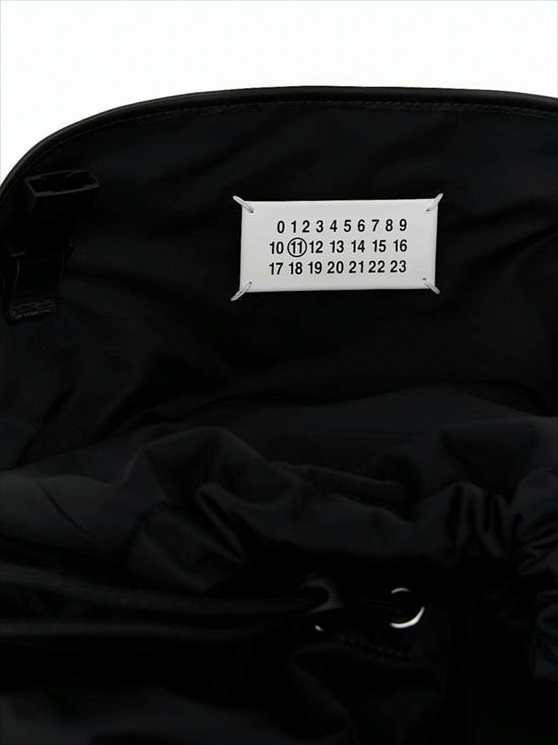 Functional Black Backpack with Adjustable Closure