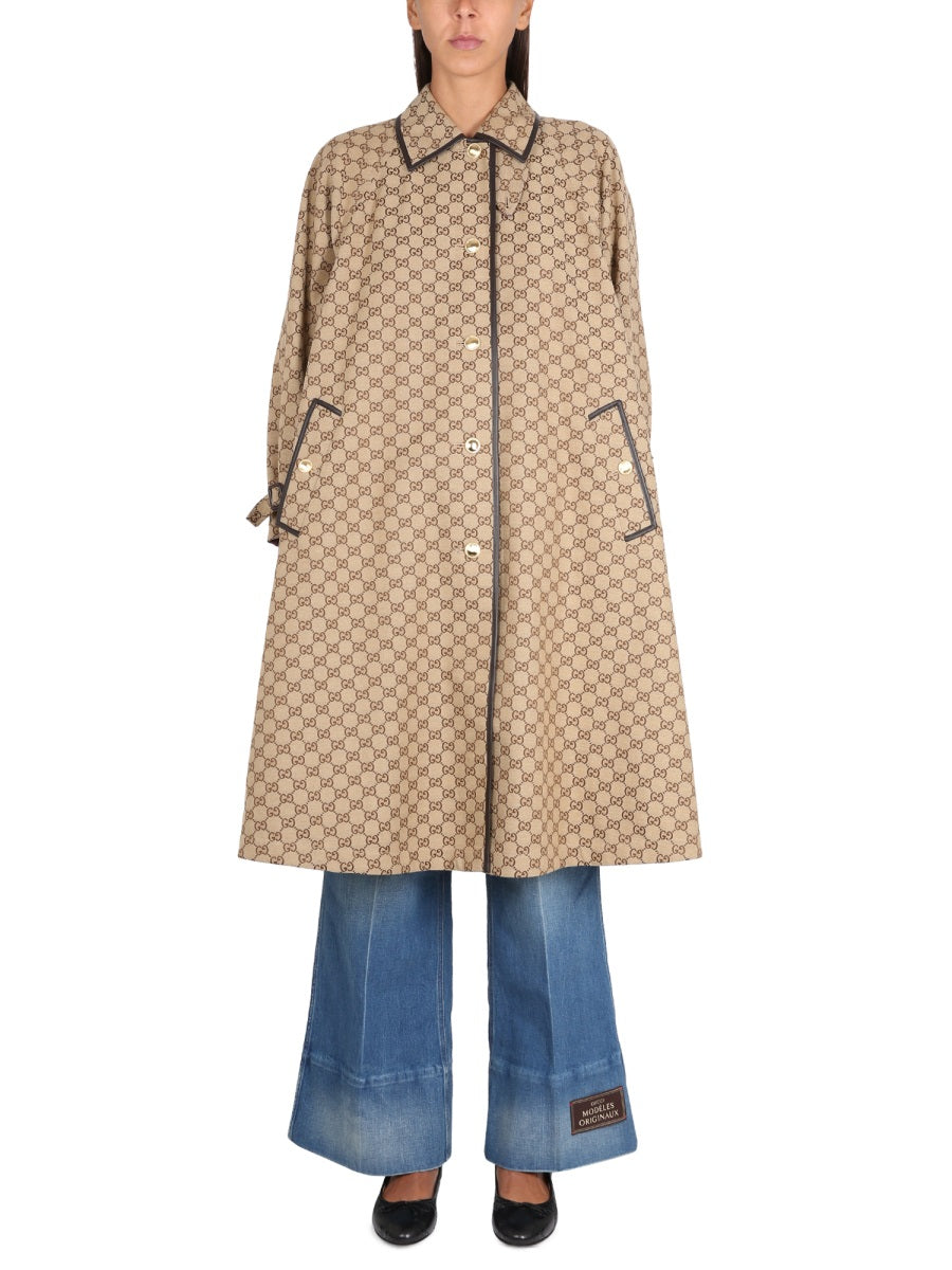 Pointed Collar Reversible Coat with Distinctive Button Closure