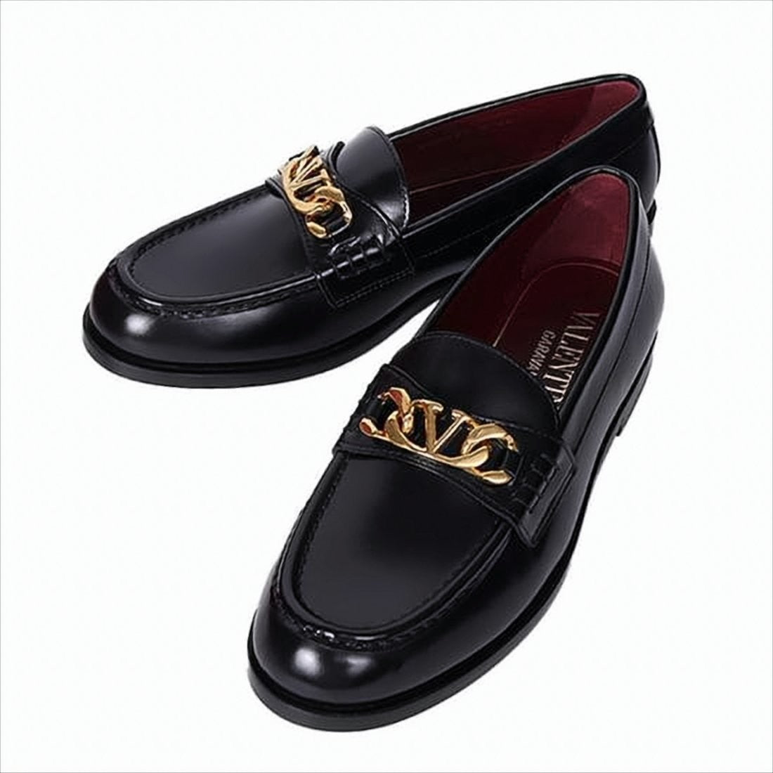 Polished Black Leather Loafers with Gold-Tone Chain Detail