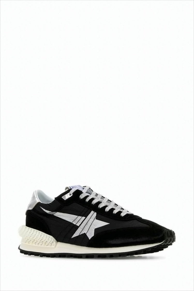 Low-Top Sneaker Featuring Distinctive Silver Star Design