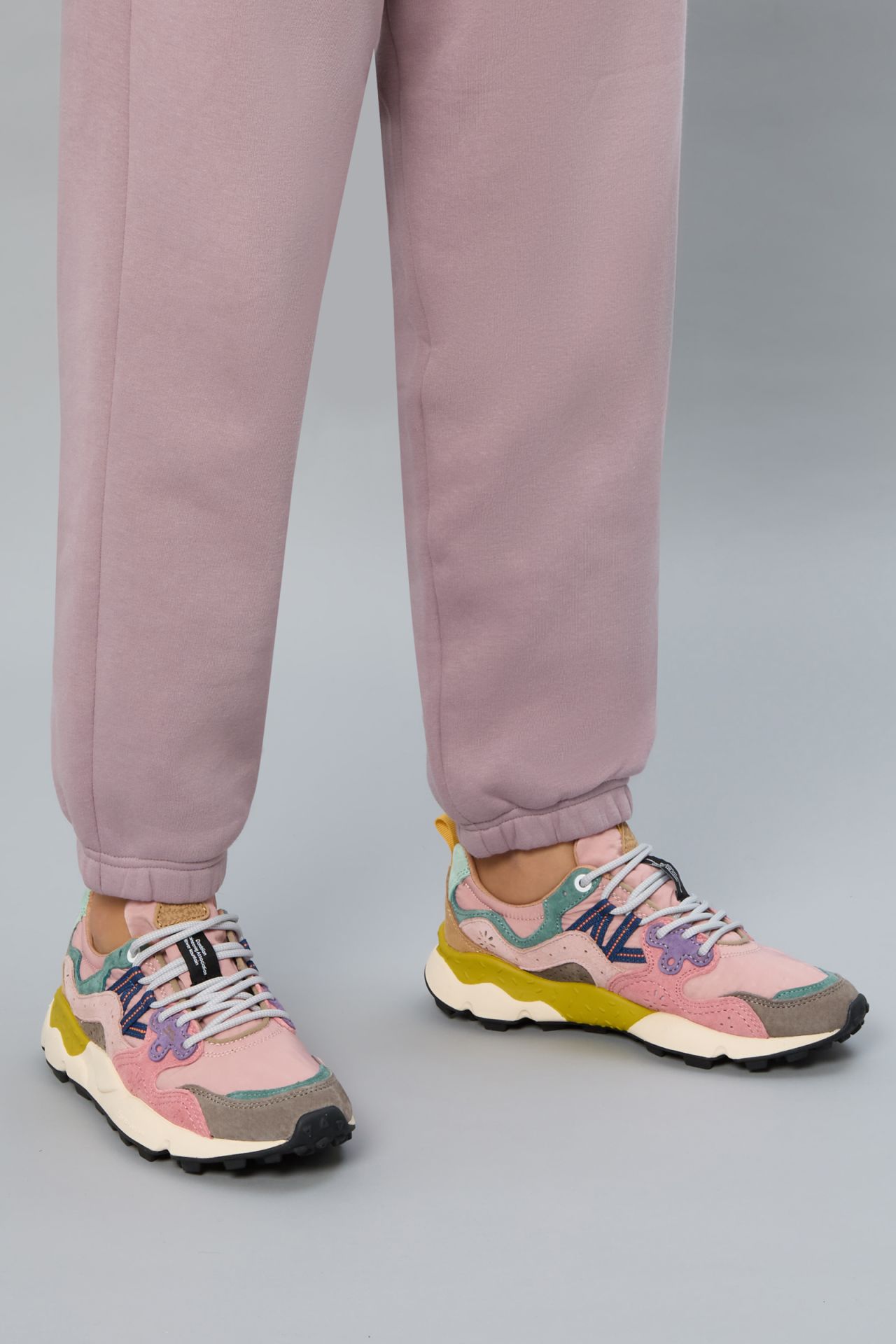 Multi-Layered Sneakers with Pastel Overlays and Chunky Sole