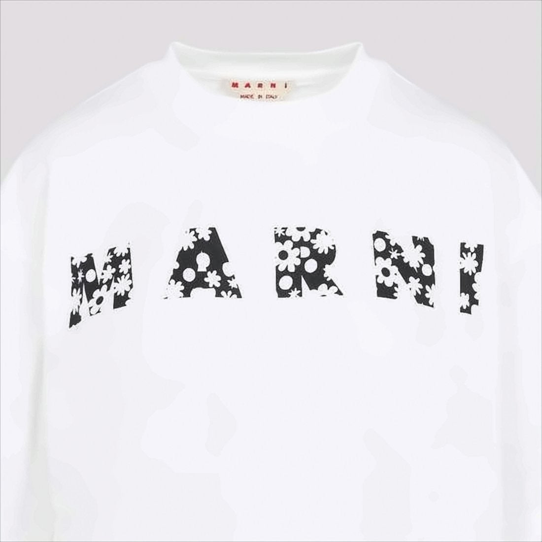 White Short-Sleeve T-Shirt with Floral Graphic Design