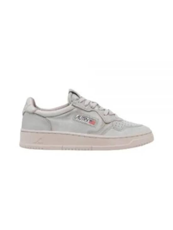 Minimalist Low-Top Sneakers with Textured Sole and Perforated Detail