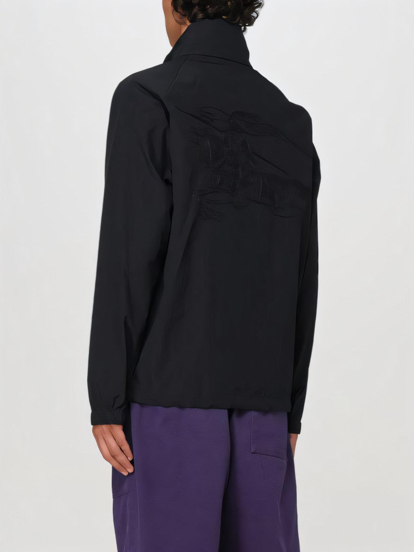 Black Jacket with High Collar and Full Zip Closure