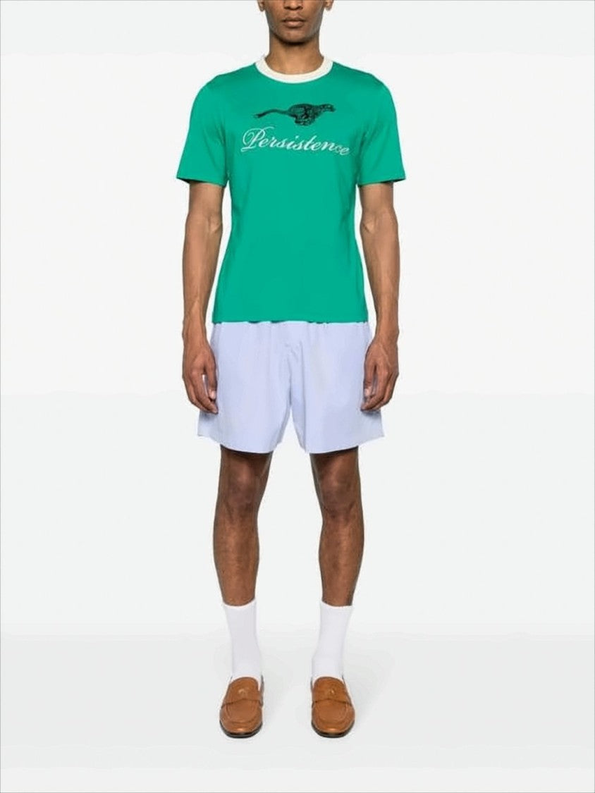 Green Graphic Tee with Leopard and Script Design