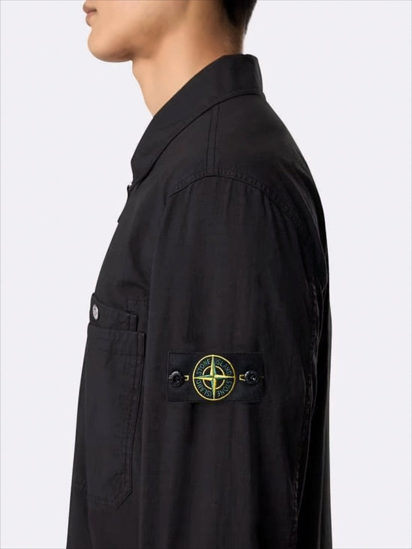 Black Jacket with Classic Collar and Distinctive Patch