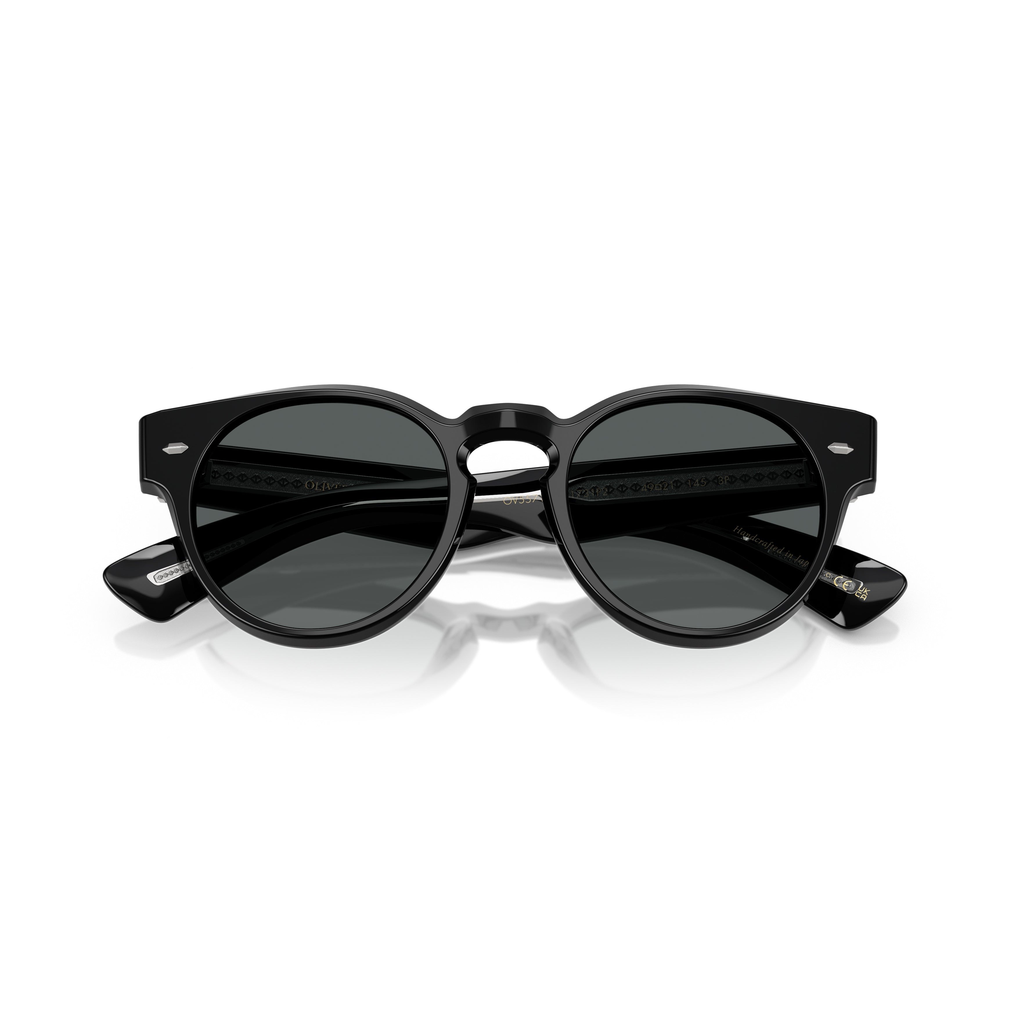 0ov5571su Round Frame Sunglasses with Subtle Silver Accents
