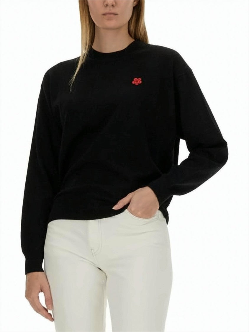 Classic Black Wool Sweater With Ribbed Cuffs And Subtle Detail