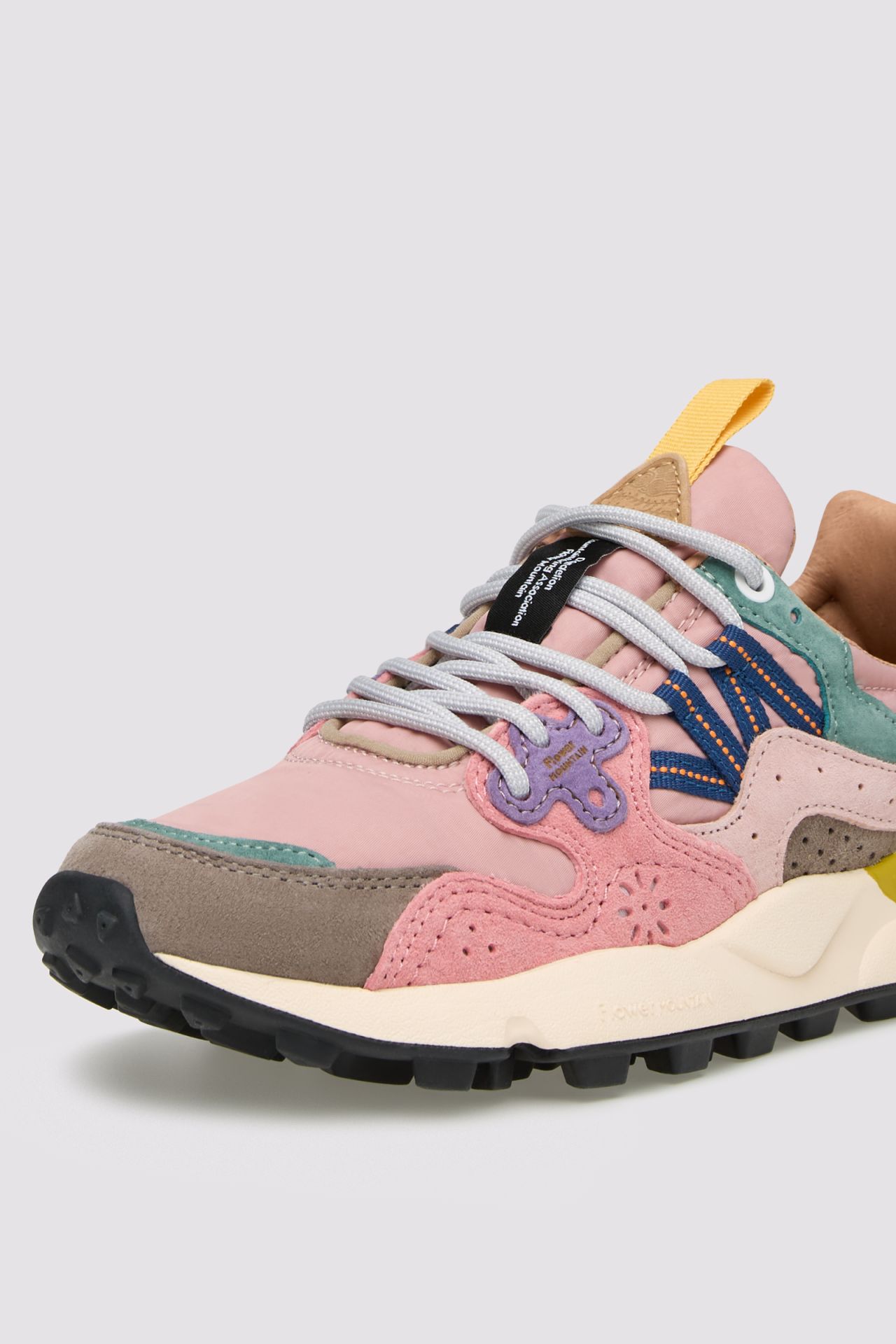 Multi-Layered Sneakers with Pastel Overlays and Chunky Sole