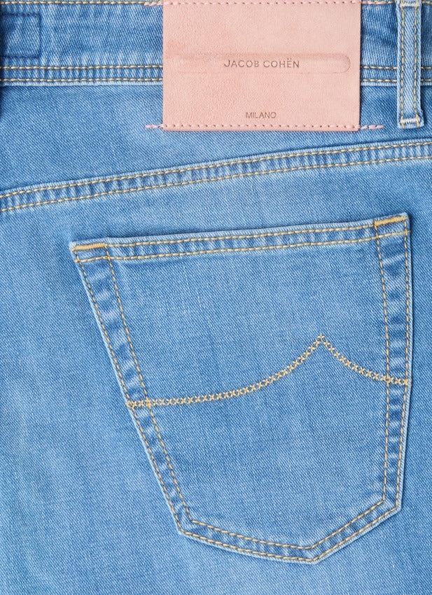 Slim Carrot Fit Blue Jeans With Vintage Effect And Fragrant Detail