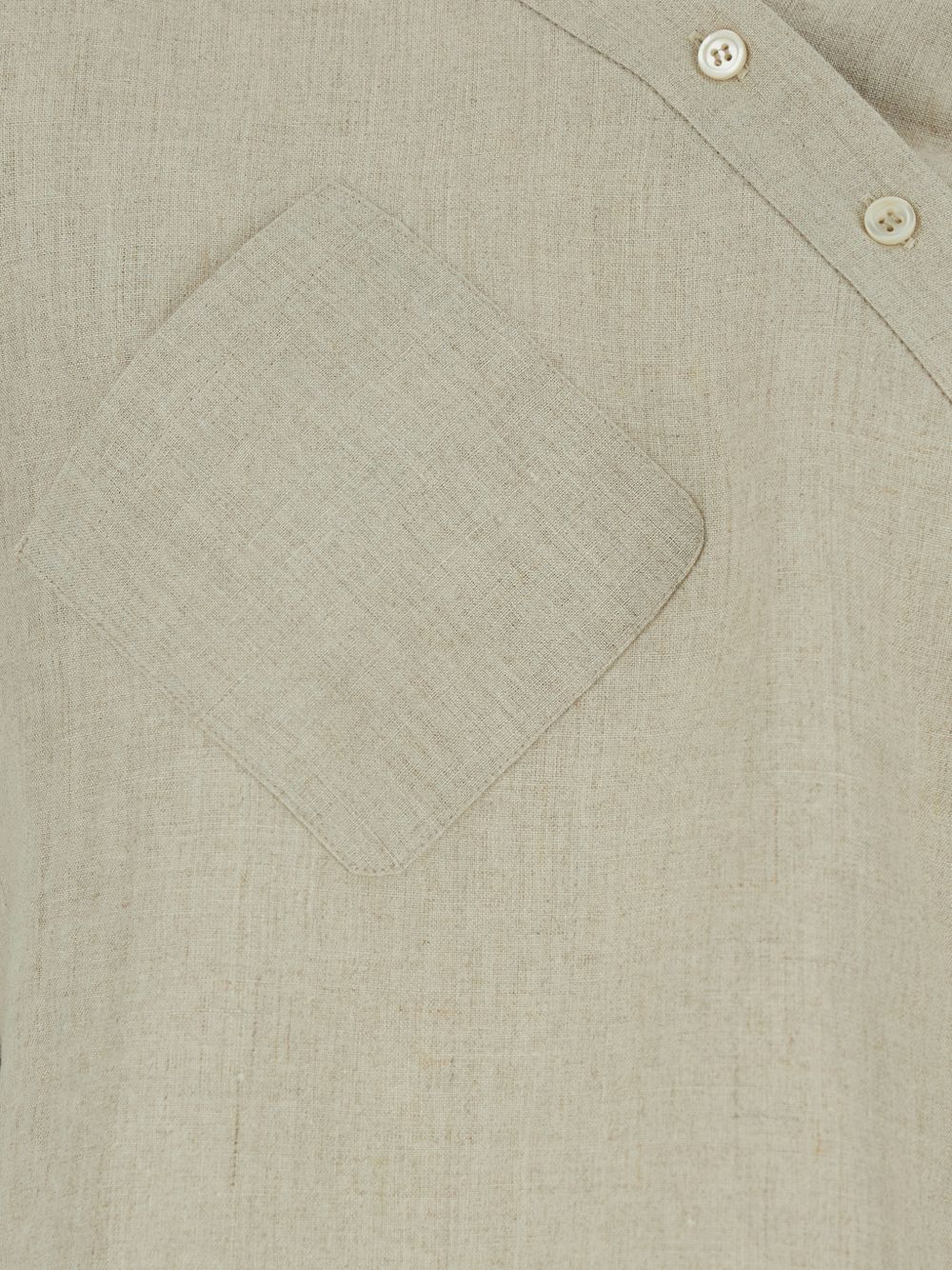 Asymmetrical Beige Shirt With Diagonal Button Closure And Minimalist Appeal
