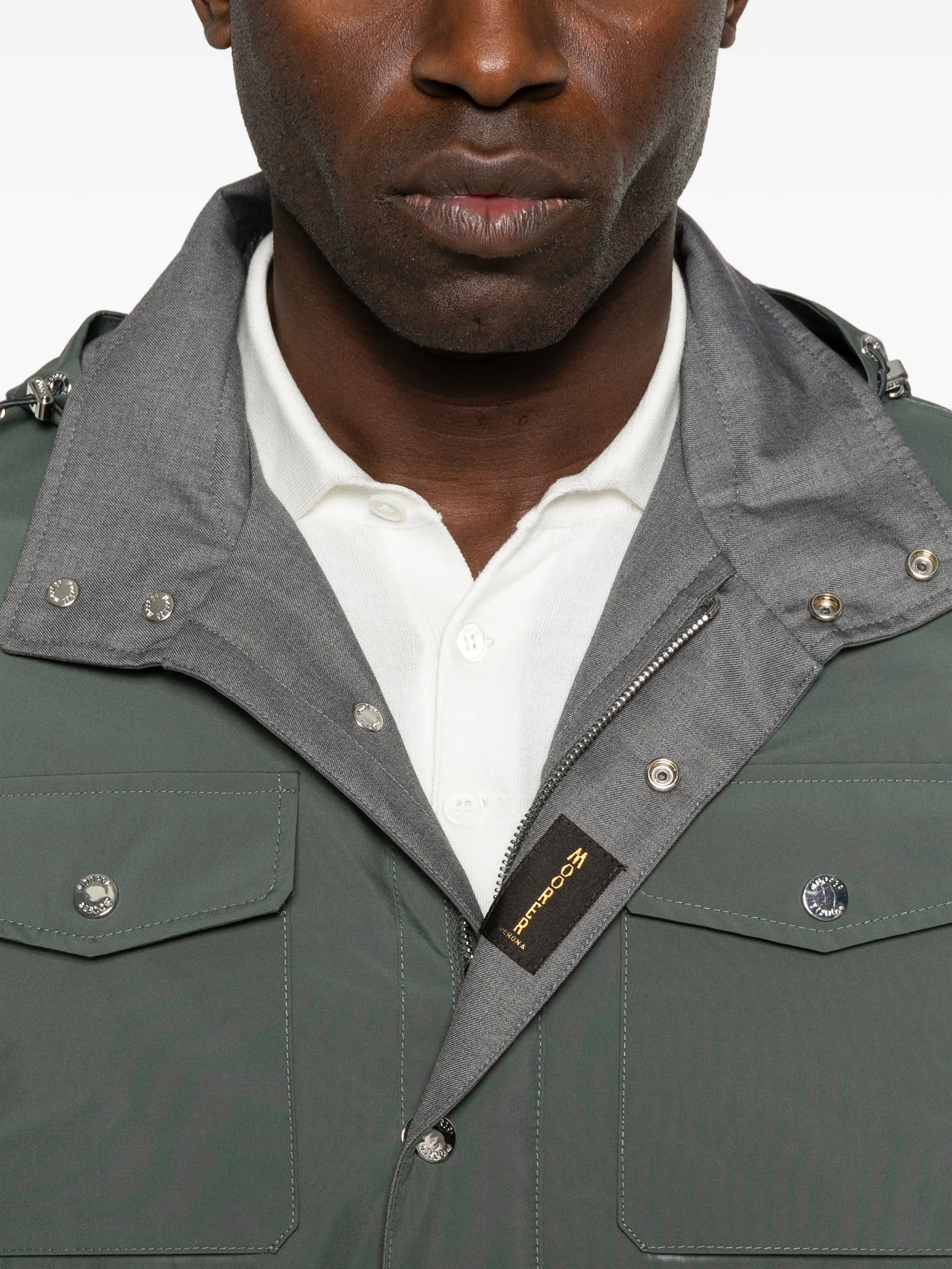Muted Green Jacket With Adjustable Hood And Functional Pockets
