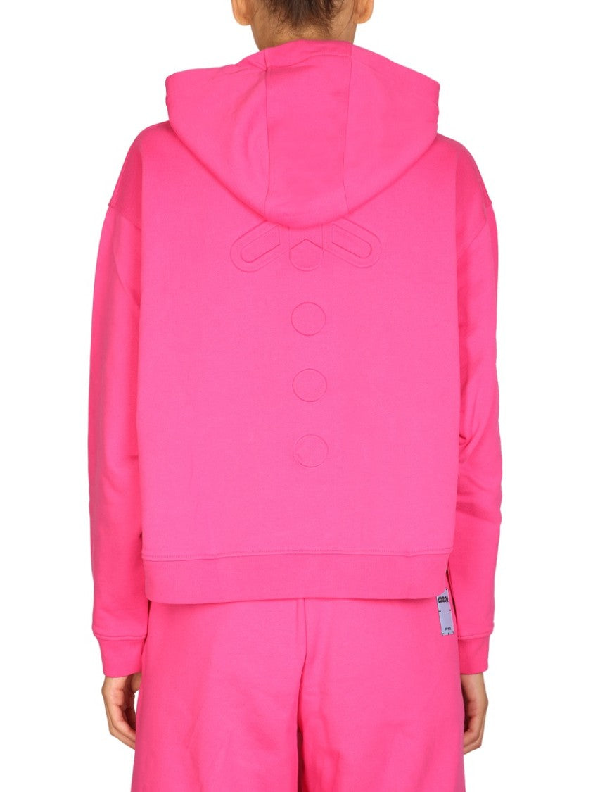 Relaxed Pink Hoodie With Embossed Detailing