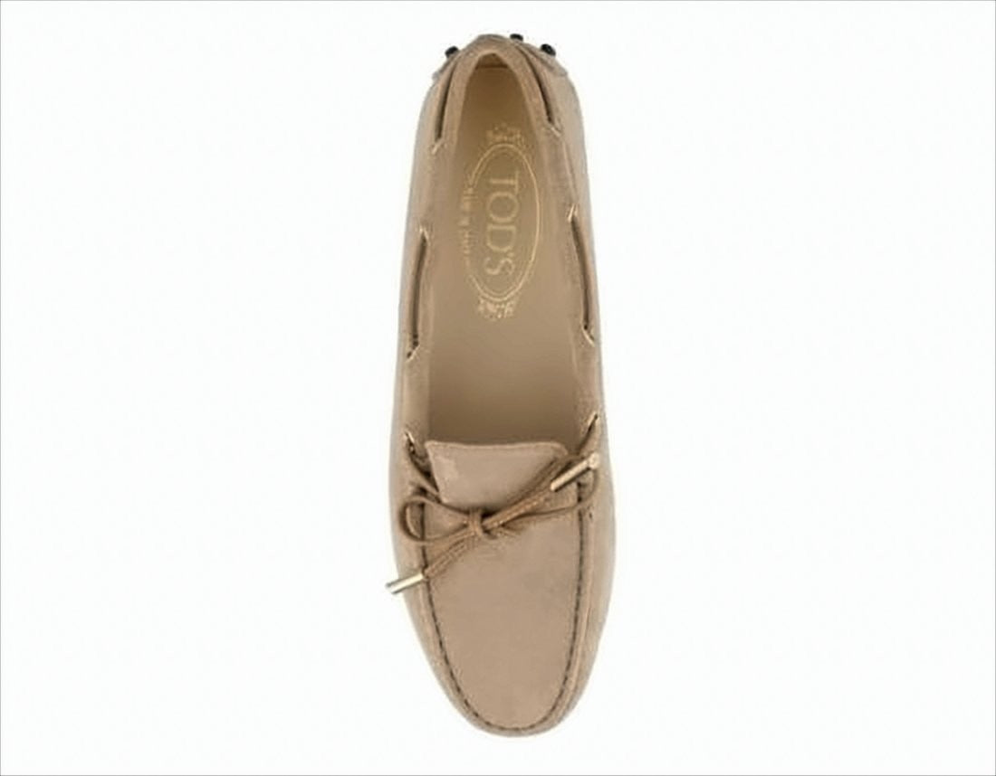 Classic Suede Loafer with Decorative Bow and Signature Pebbled Sole