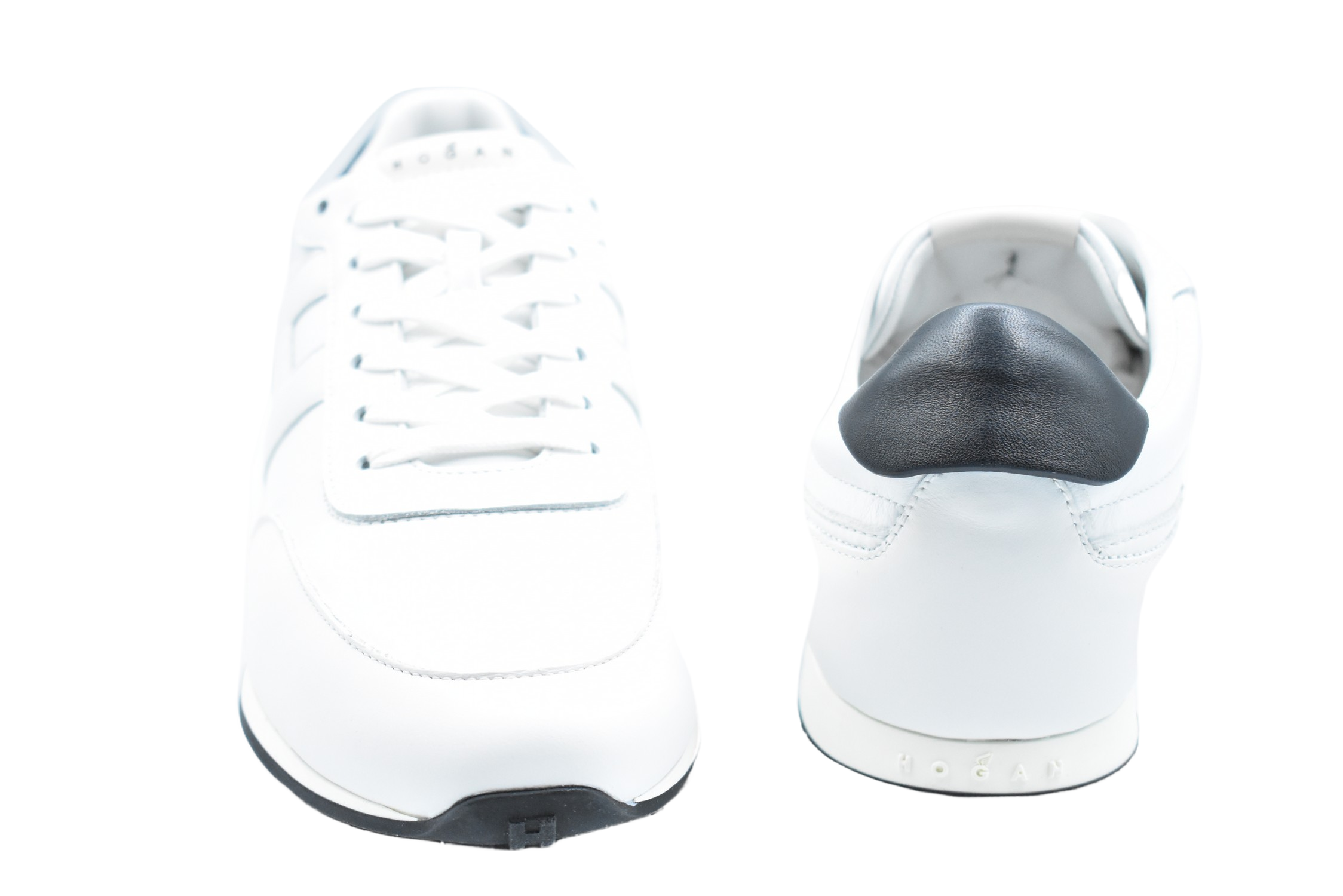 Vintage-Inspired White Sneakers With H-Stud Details