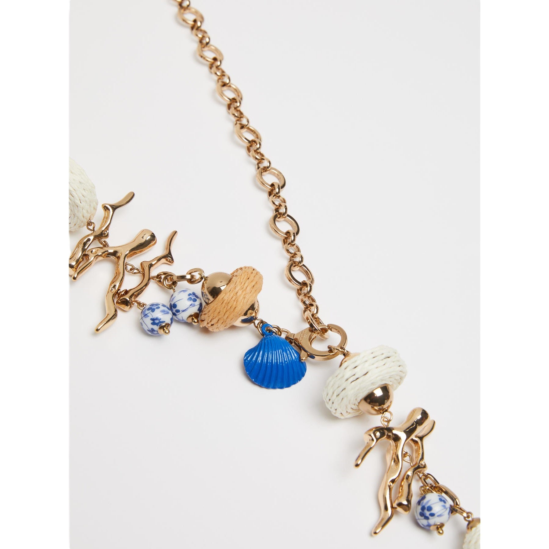 Asymmetrical Gold-tone Charm Necklace with Artistic Elements