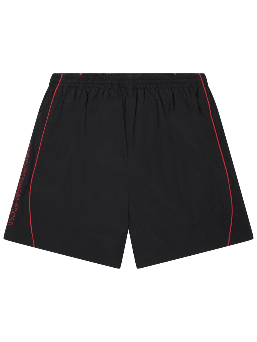Sleek Black Sports Shorts With Red Piping