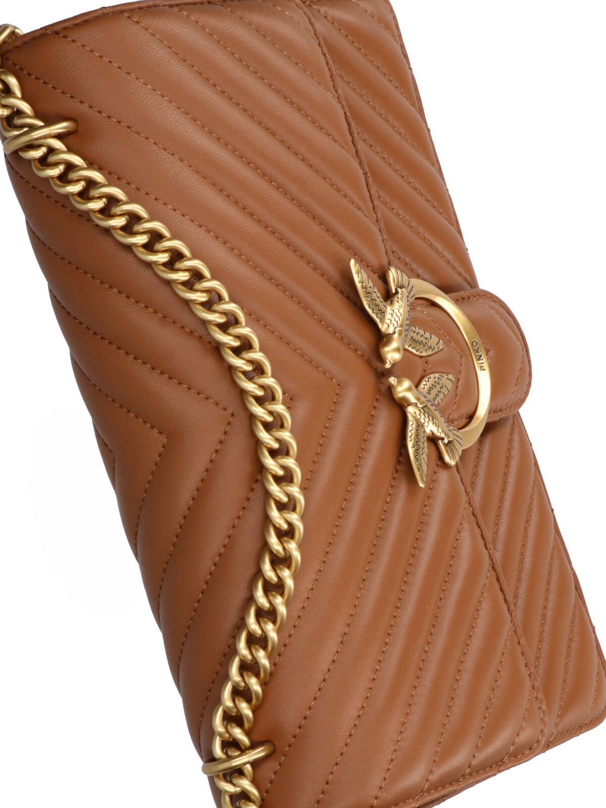 Structured Brown Handbag With Versatile Carrying Options