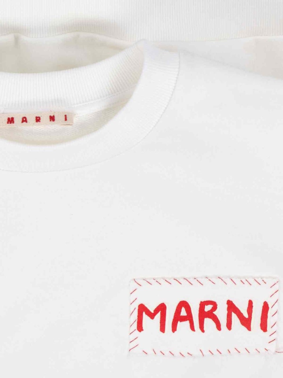 Cropped White Sweater With Bold Chest Patch