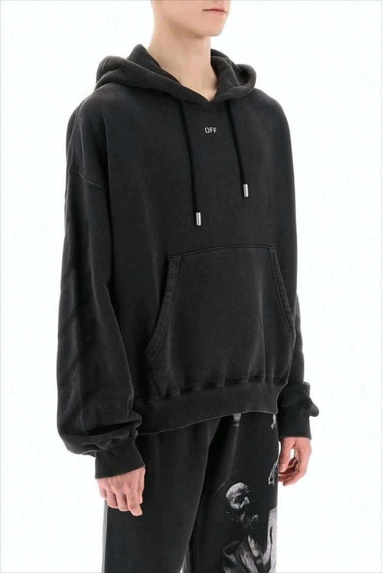 Cropped Black Hoodie with Embossed Detailing and Graphic Print