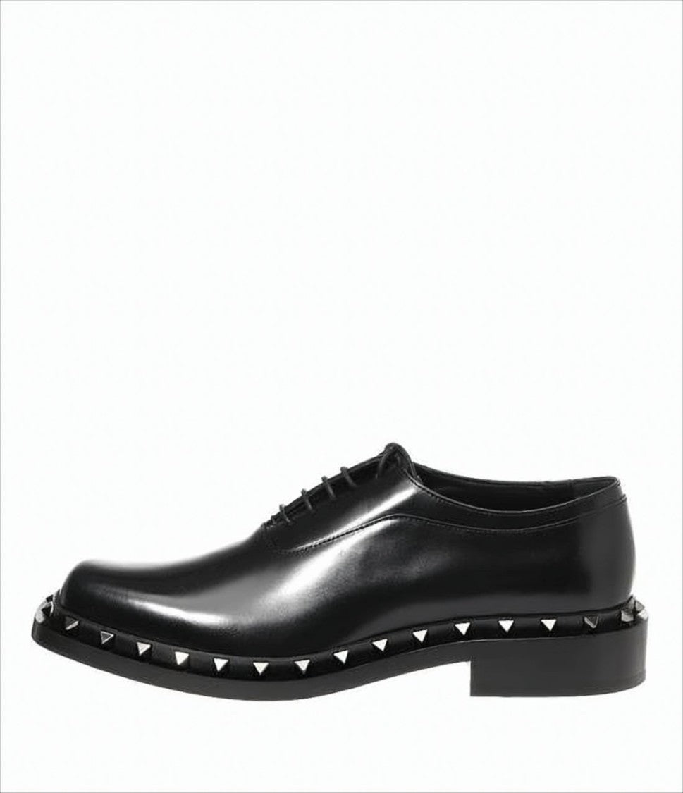 Classic Black Leather Loafers with Metallic Pyramid Studs
