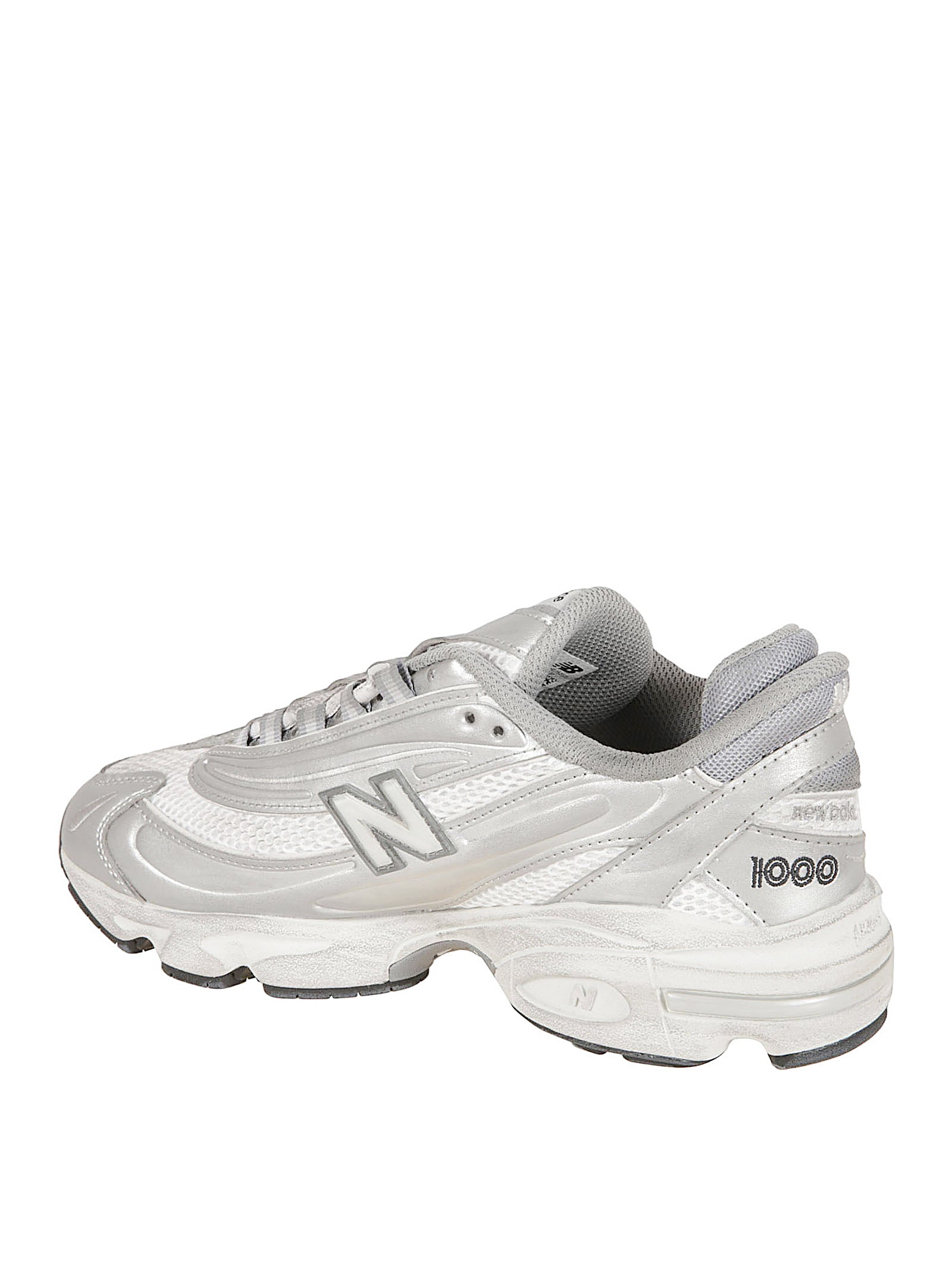 Streamlined Silver Sneakers With Textured Sole
