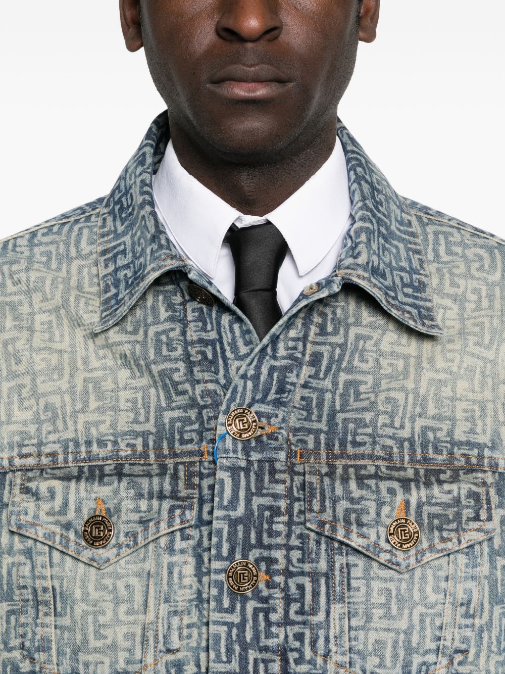 Faded Denim Jacket with Monogram Pattern