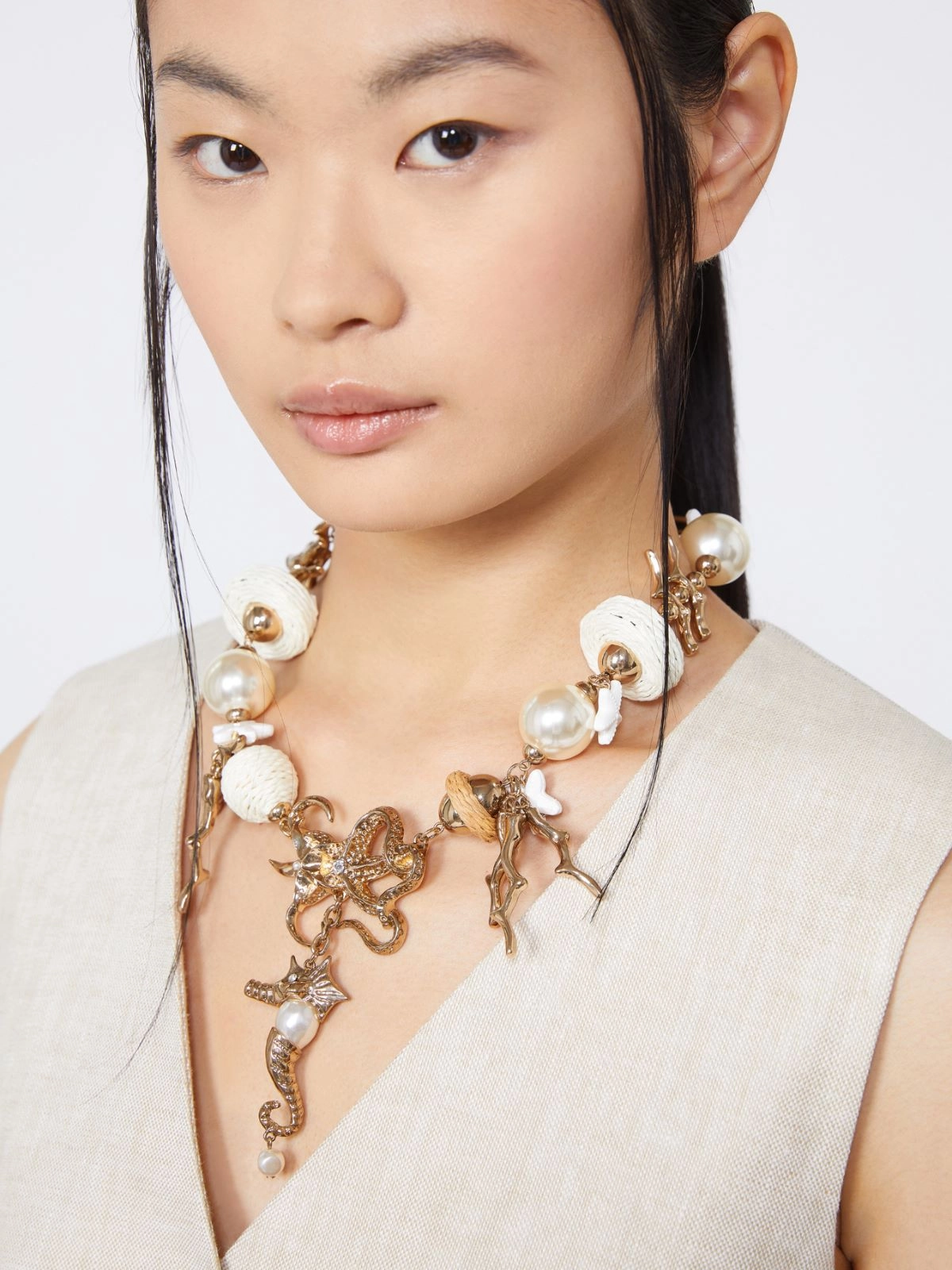 Statement Necklace with Coral-Inspired Gold Elements