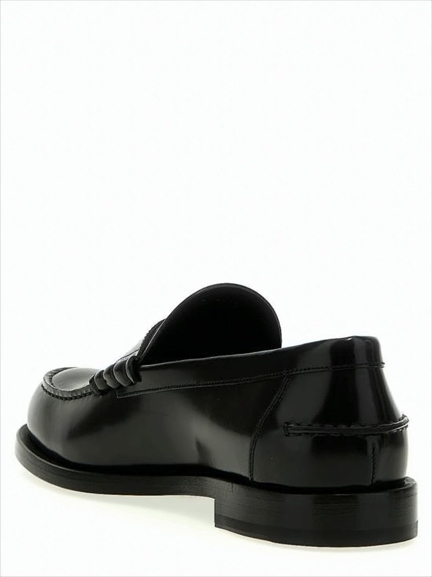 Polished Black Calf Leather Loafers with Iconic Emblem