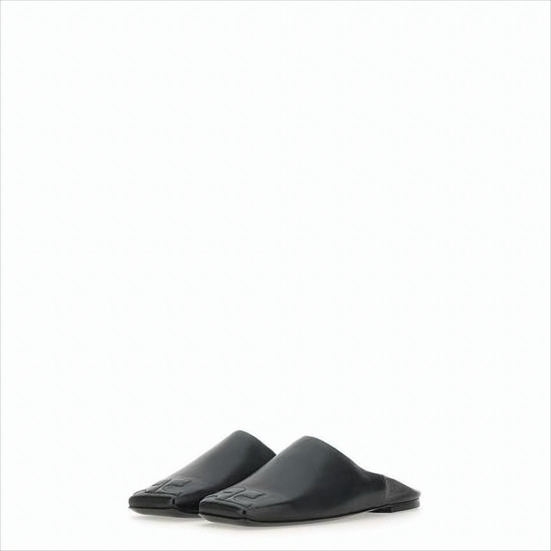 Minimalist Black Lambskin Slip-On Mules with Embossed Detail