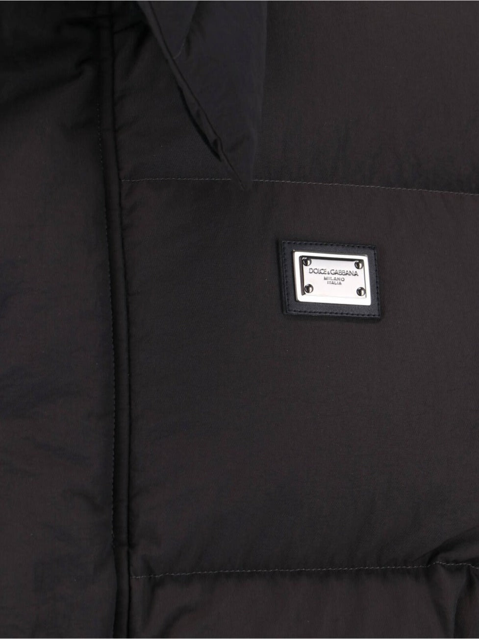 Quilted Black Puffer Jacket With High Collar And Adjustable Hood