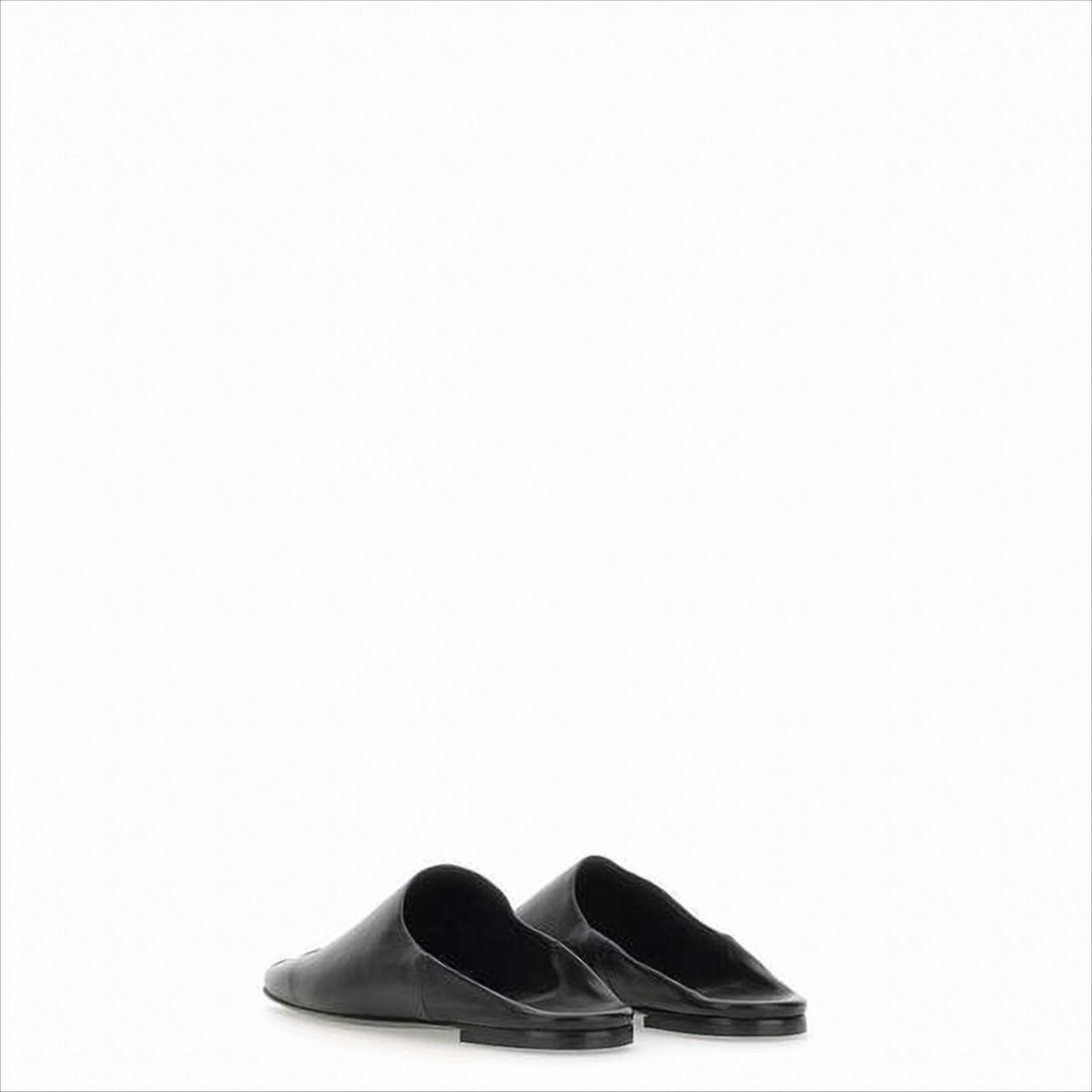 Minimalist Black Lambskin Slip-On Mules with Embossed Detail