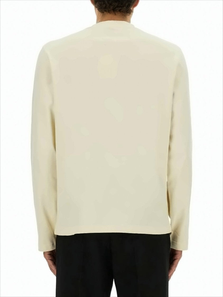 Long-Sleeve Off-White Cotton T-Shirt with Subtle Logo Patch