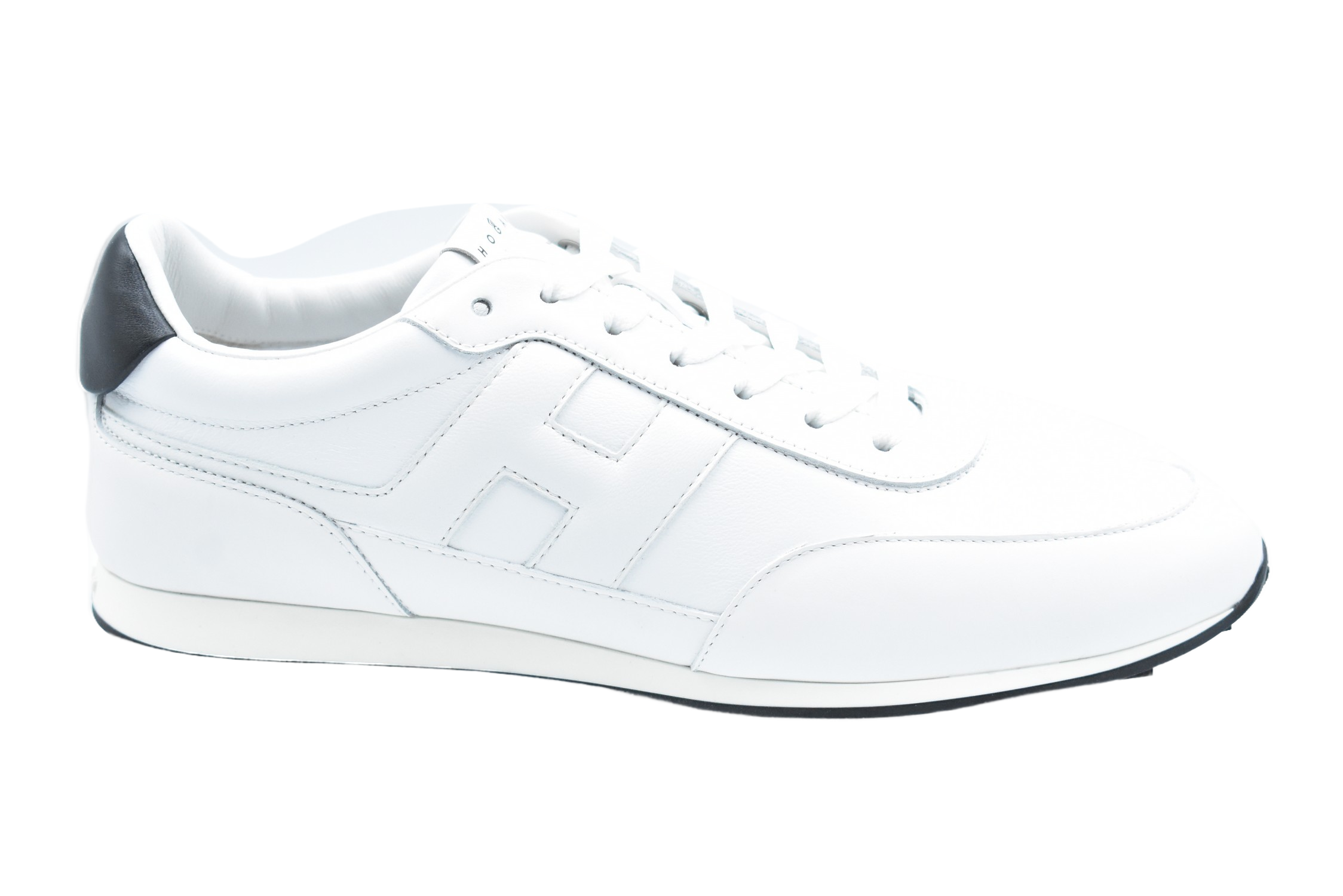 Vintage-Inspired White Sneakers With H-Stud Details