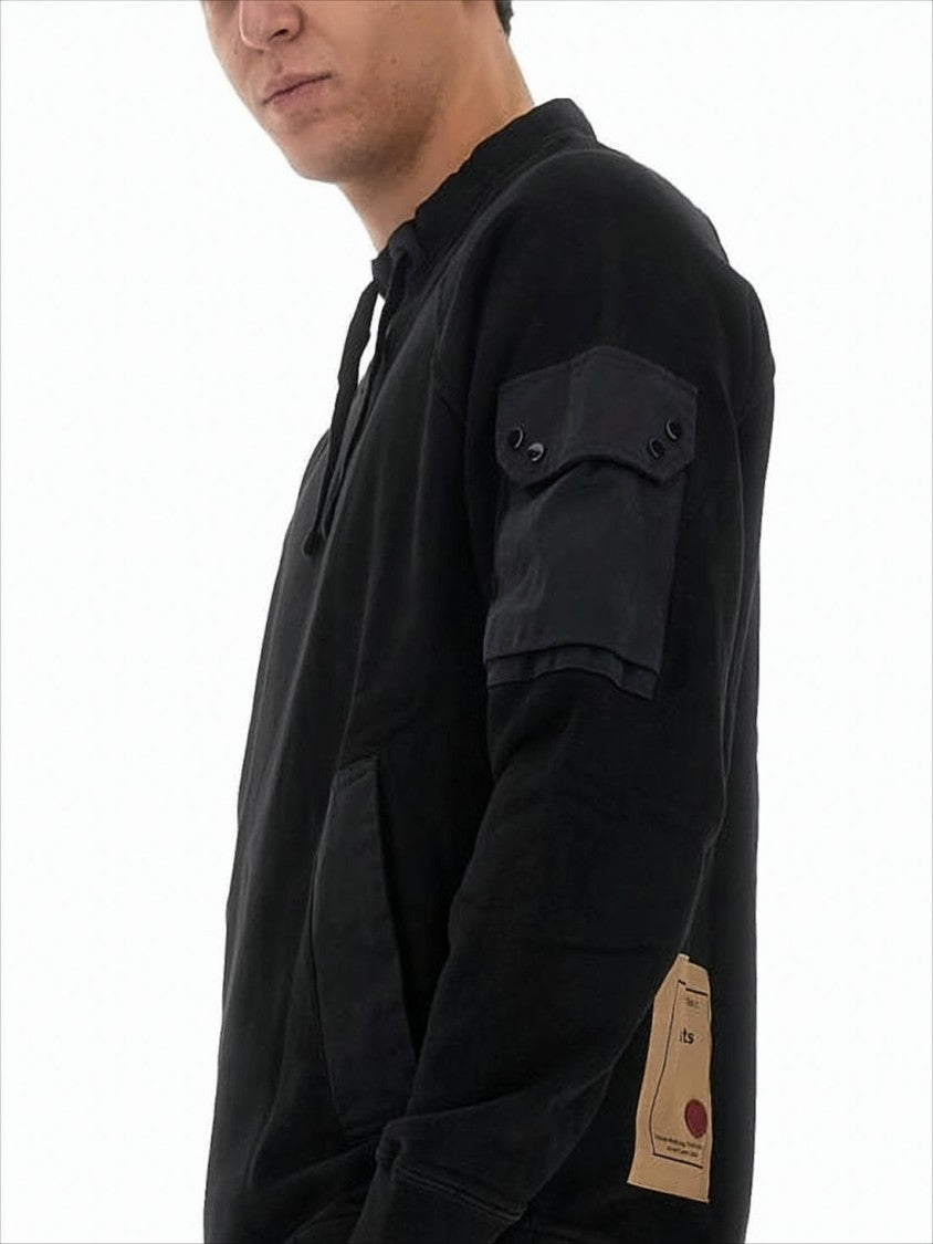 Relaxed Fit Long-Sleeve Tee with Adjustable Drawstrings and Unique Pockets