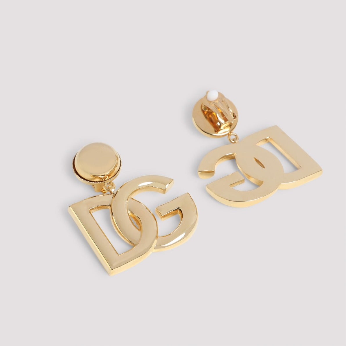 Bold Brass Earrings With Distinctive Double-Letter Motif