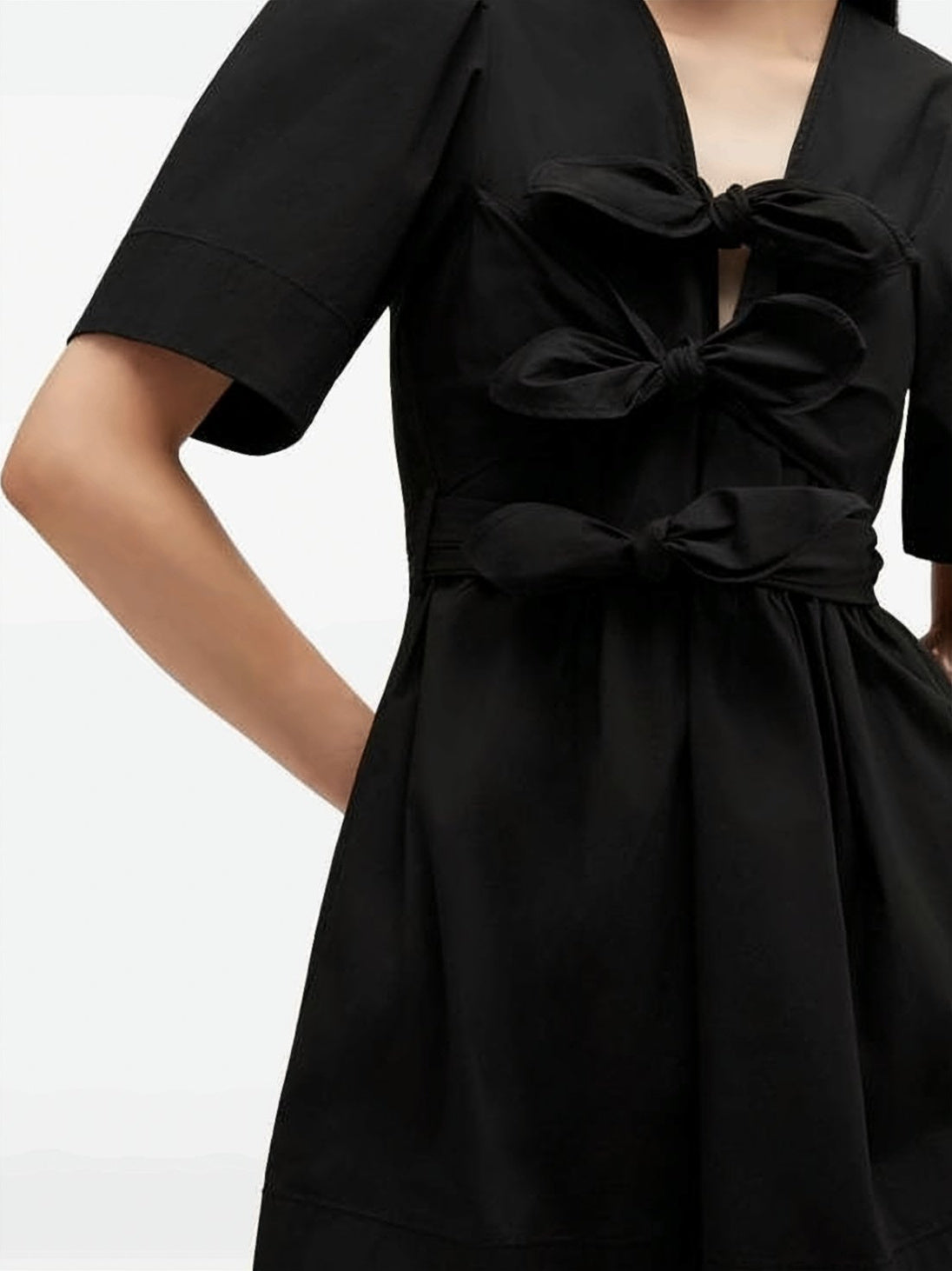Mini Dress with Deep V-Neckline and Bow Detail