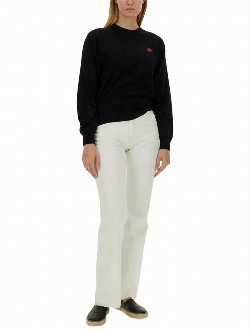Classic Black Wool Sweater With Ribbed Cuffs And Subtle Detail